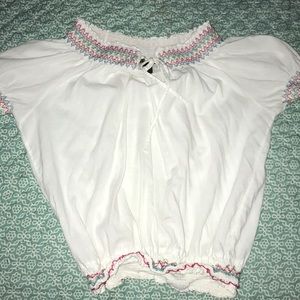 Off the shoulder festival shirt .